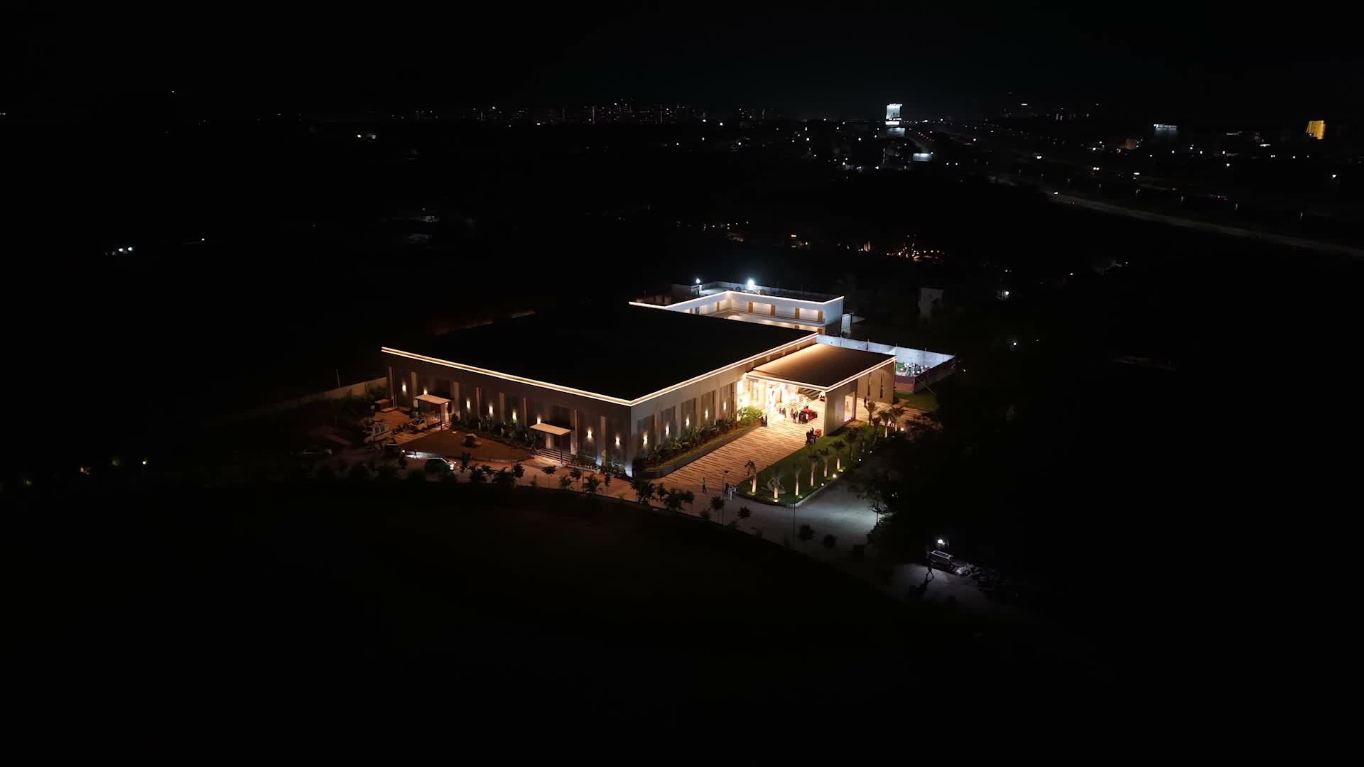 Illuminated driveway and entrance at Samruddhi